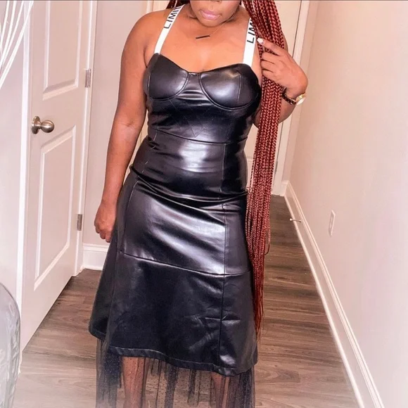 Black Leather dress/ with strap on Ed h shoulder